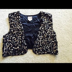Sparkly black vest