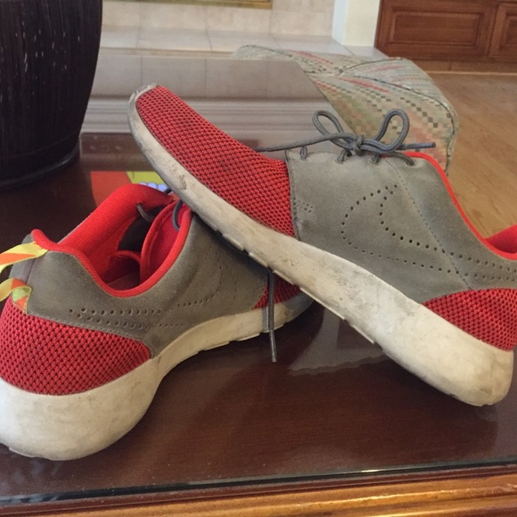 Red Nike Roshe Run shoes