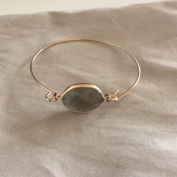 Gold bracelet with stone