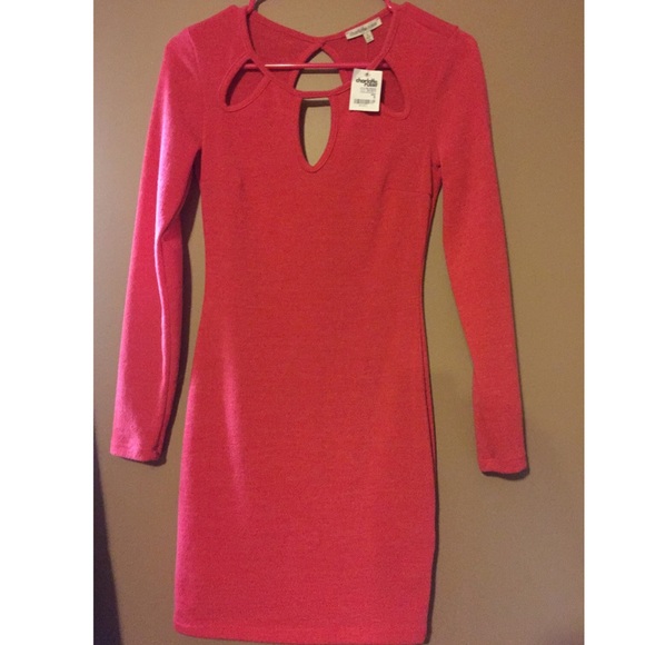 Red body-con dress. Keyholes front and back.
