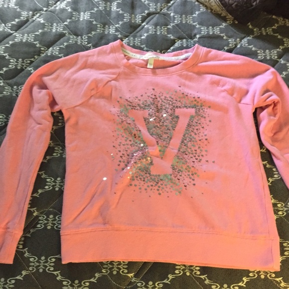 VS crew sweatshirt.