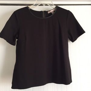 Cute black tee w/ zip in back