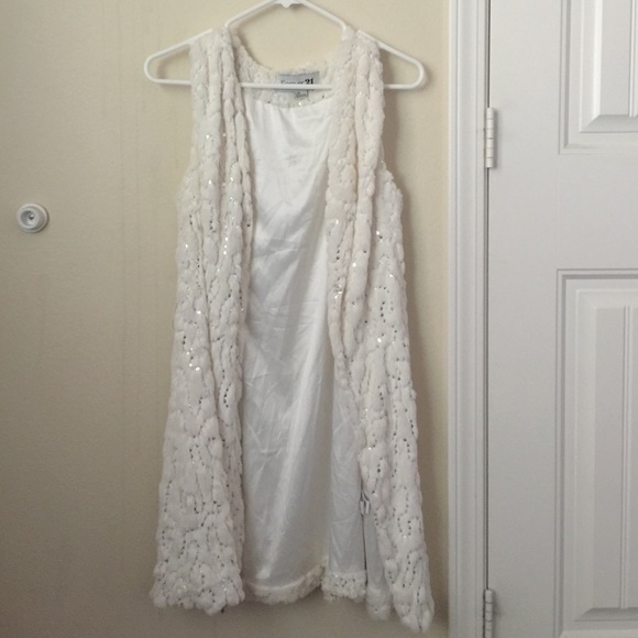 White faux fur vest