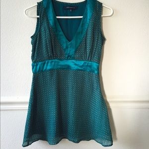 Teal blue green colored Sleeveless top.