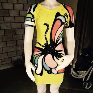Yellow butterfly dress. Never been worn.