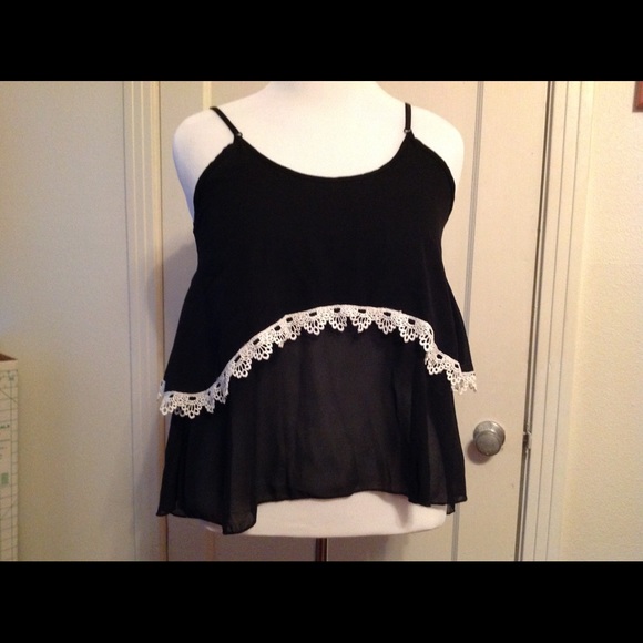 Black chiffon top with lace trim and open back. - Picture 1 of 3