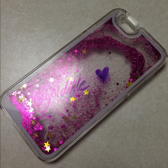 a clear case with pink sparkles. sign by me.