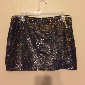 Black and gold sequined mini skirt