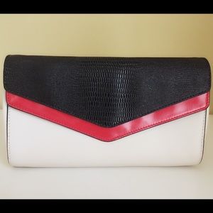 BCBG clutch and Tory burch crossbag