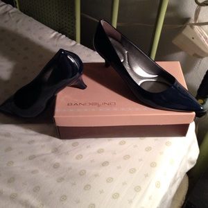Navy blue patent leather pumps