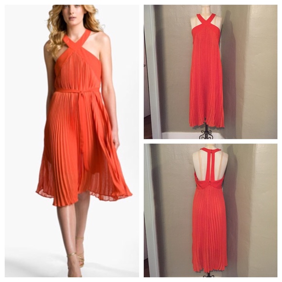BCBGMaxAzria Dresses & Skirts - BCBGMaxAzria Open back orange midi dress!