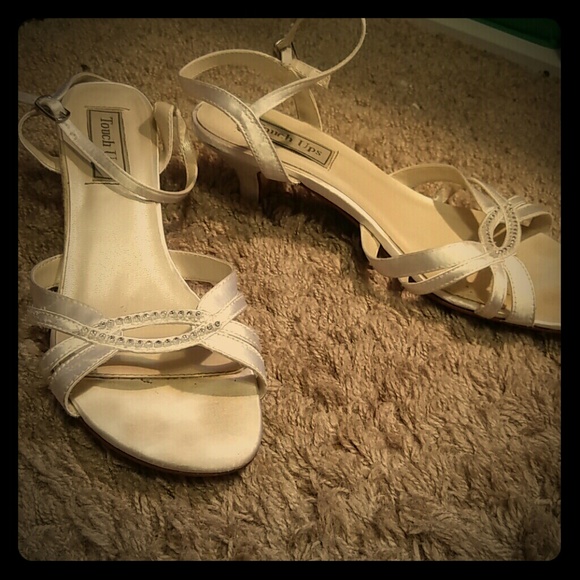 White kitten heels