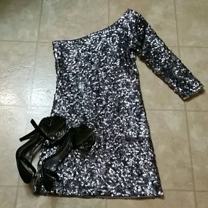 Sequin one sleeve party dress.
