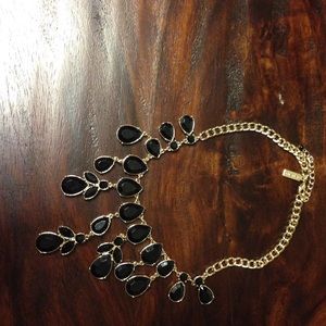 The Limited dark dark blue necklace.