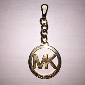 Gold MK Charm ✨