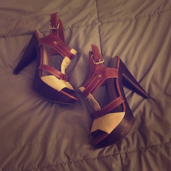 Cream and brown strappy heels.