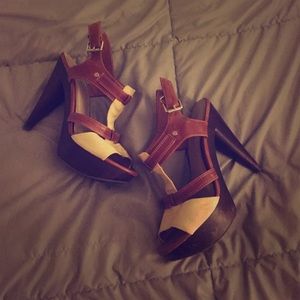 Cream and brown strappy heels.