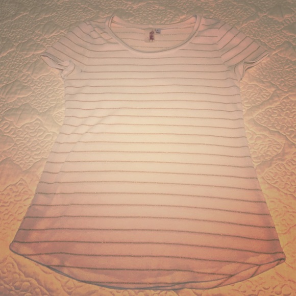 White and gold short sleeve top.