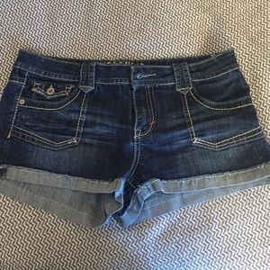 Hydraulic cuffed jean shorts