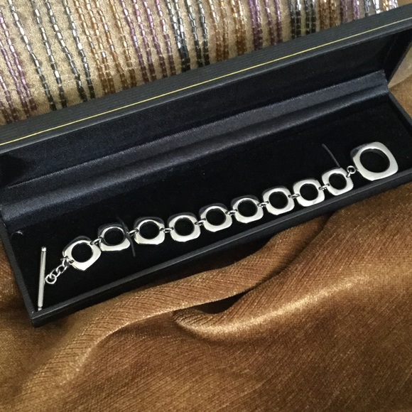 Silver tone toggle bracelet