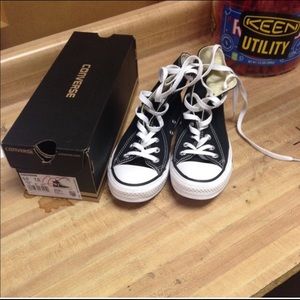 reselling high top black and white converse