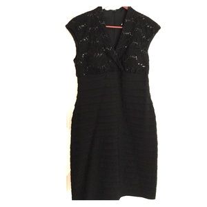 Black cocktail dress with sequin detail