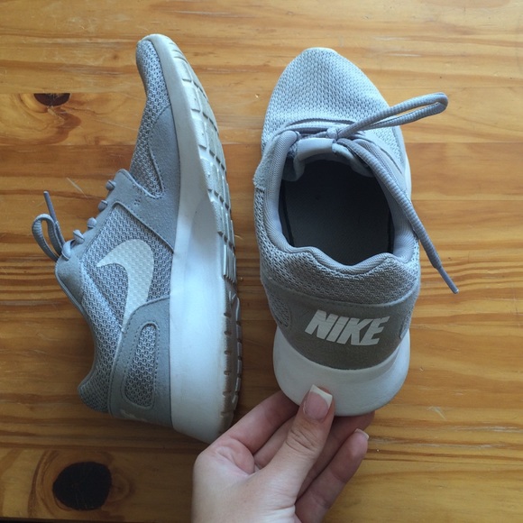 Grey Nike running shoes