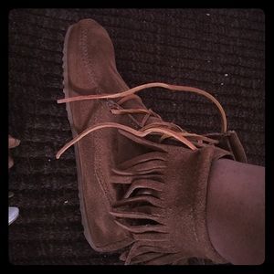 Brand new Minnetonka moccasins size 8 .