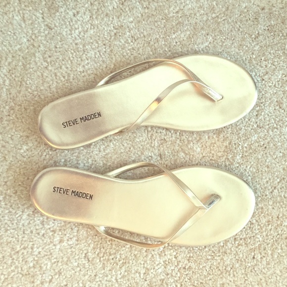 Gold Steve Madden sandals.