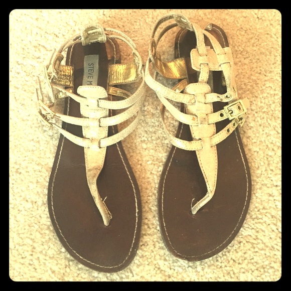 Steve Madden gold sandals.
