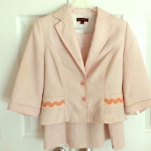 Peach suit with trim detailing