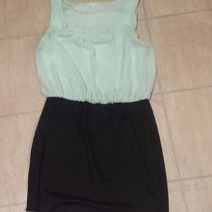 Turquoise and black dress