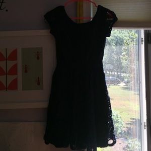 A nice navy blue, lace dress.