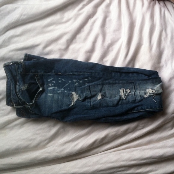 Never worn distressed denim jeans