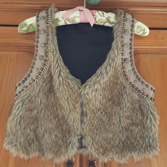 Fur and nailhead/rivit/chain vest