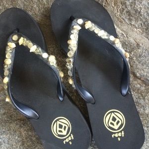 Shell embellished Reef flips