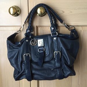 guess blue leather like bag.