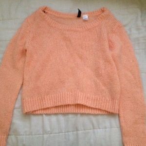 Light orange sweater