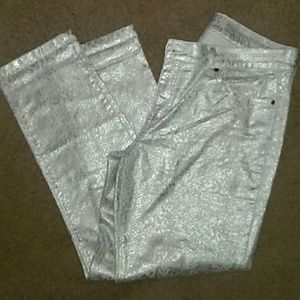 Metallic silver snakeskin skinny jeans