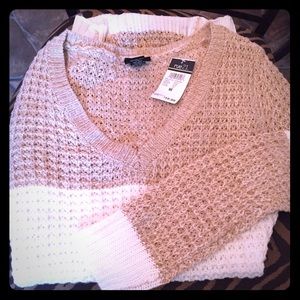 Comfy high low long sleeve sweater.