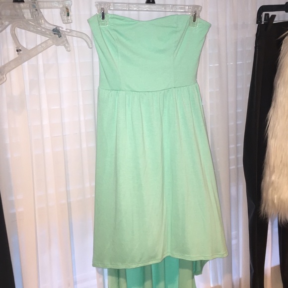 Mint green high to low strapless dress.