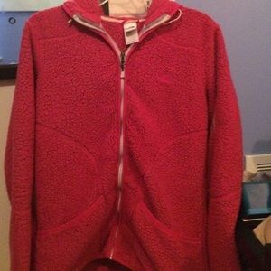 Pink Zip up North Face with hood.