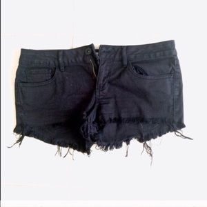 Black distressed shorts