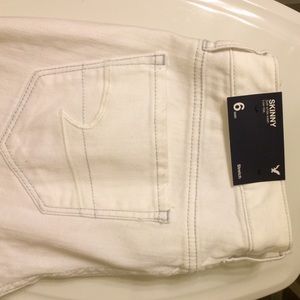 American Eagle white skinny jeans