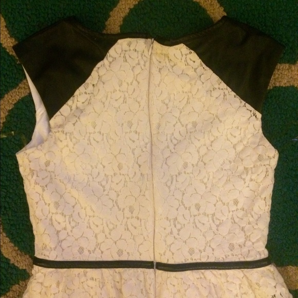 Lace dress with leather sleeves and waist. - Picture 3 of 3