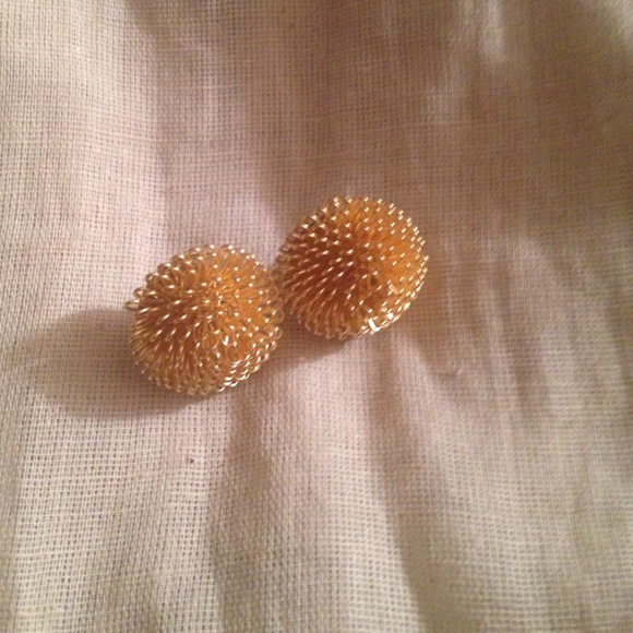 Gold tone eccentric earring