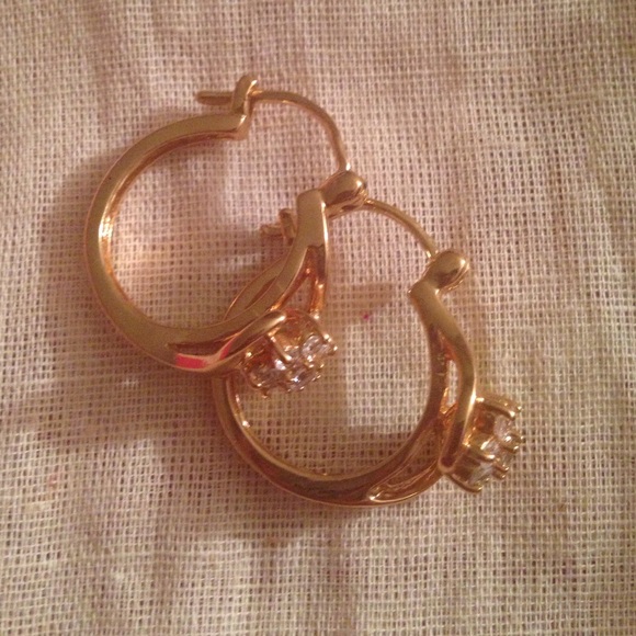 Gold tone hoops - cz flower detail
