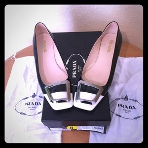 Prada black and white flats.