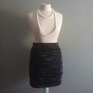 Black velvet like mini skirt