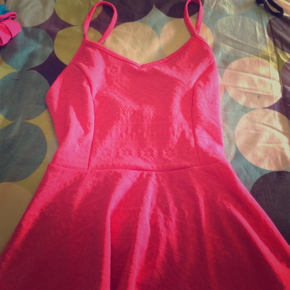 Wet seal top with bow on the back